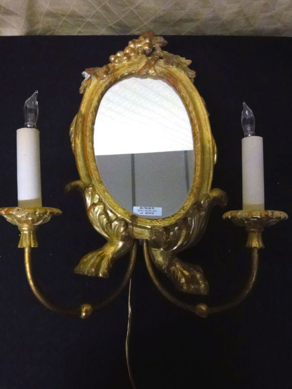 A Pair of Gilt Wood Sconce with Mirrors & Lion's Paw Feet
