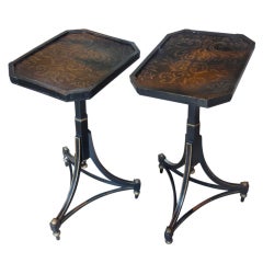 A Pair of Regency Style Ebonized Candlestands