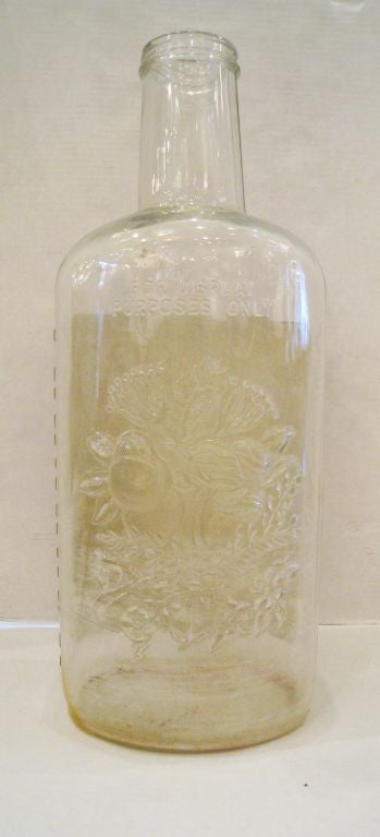 Large Schenley Gin Display Bottle from London. Great carving to the sides and back.