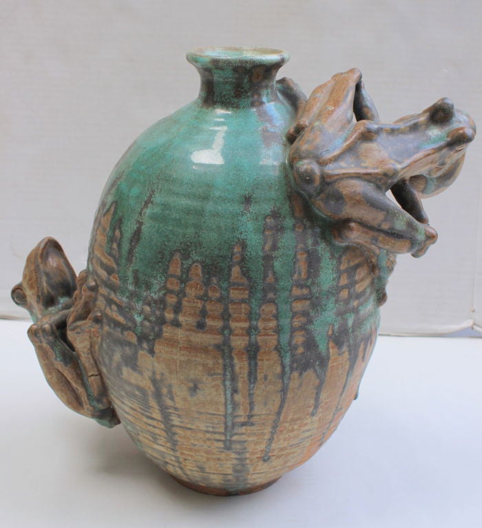 Husband and Wife ceramic Artists  Max and Ellen Cline worked together from the early 70's until Max's death in the early 1990s.  The Large piece depicts 2 frogs applied to the vase. The vase has been ventilated for use as a lamp.  Signed and dated