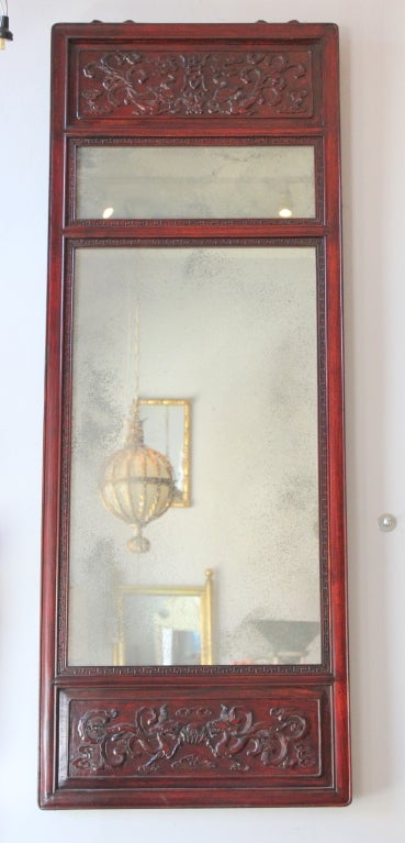 Pair of Chinese rosewood trumeau mirrors. Greek key motif.