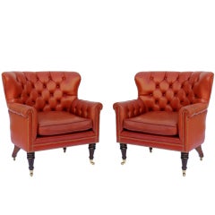 Pair of Leather Club Chairs on Casters