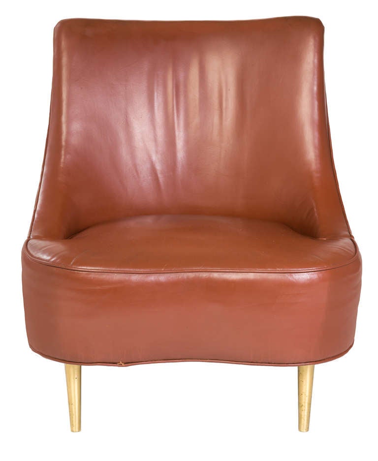 Edward Wormley tear drop chair, model 5106

Chair in original condition with Dunbar leather, work was a special order finish for prior estate. Matching chair and ottoman available.
 
Dunbar, USA , circa 1957.
Brass, leather over wooden