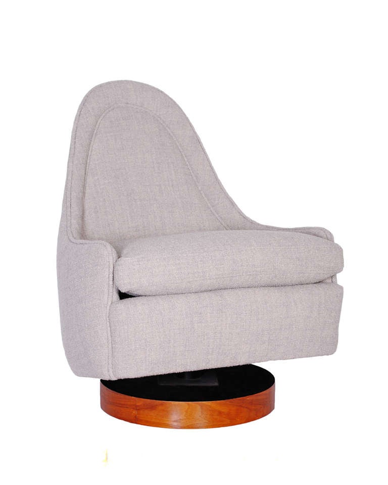 Milo Baughman

lounge chair

Thayer Coggin
USA, c. 1960s
upholstery, walnut 
24 w x 21 d x 27 h inches

Milo Baughman tilt swivel lounge chair restored.