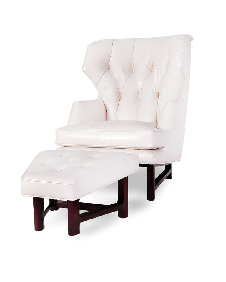 Edward Wormley 

lounge chair and ottoman, model 5761

Dunbar
USA, 1957
leather, mahogany
chair 28.5 w x 33 d x 39.5 h inches
ottoman 23 w x 18 d x 12 h inches.

Edward Wormley for Dunbar lounge chair and ottoman in a bone color leather.