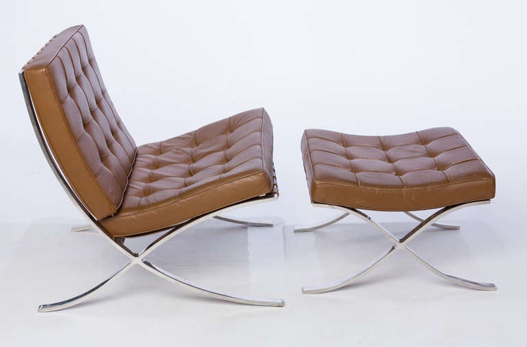 LUDWIG MIES VAN DER ROHE

Barcelona chairs, pair
Barcelona footstool

Knoll International
Germany/USA, 1929/c. 1960s
stainless steel, leather
30.5 w x 30.5 d x 29.5 h inches 

Signed with paper manufacturer's label to underside of each