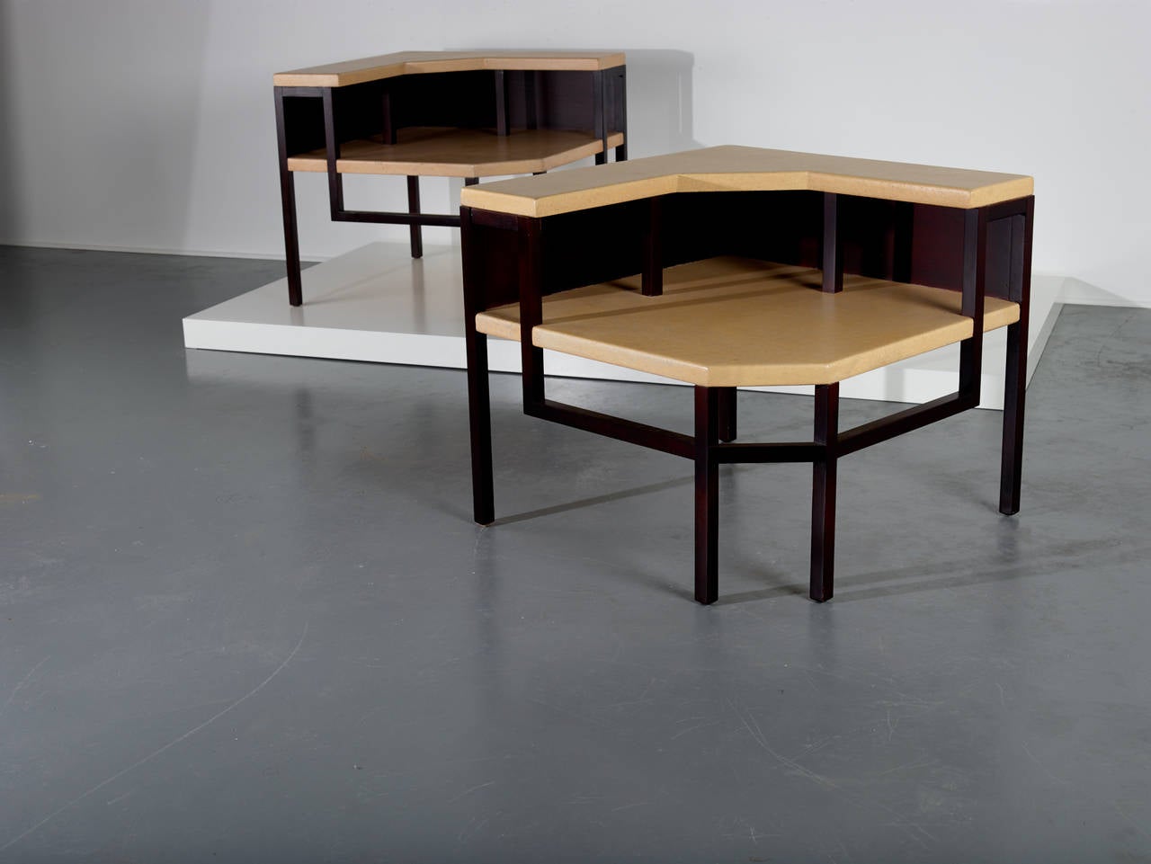 Paul Frankl.

Corner tables (pair).

Johnson Furniture Company,
USA, circa 1951.
Lacquered cork, lacquered mahogany.
32 w x 32 d x 28.25 h inches

Each branded "#5029."