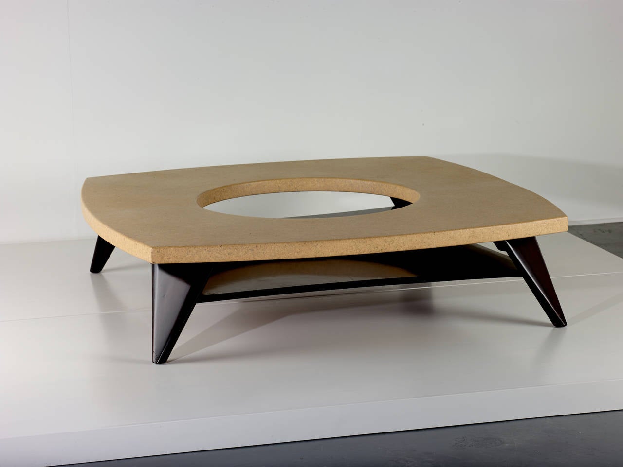 Paul Frankl.

Coffee table.

Johnson Furniture Company,
USA, circa 1951.
Lacquered cork, lacquered mahogany.
Dimensions: 60 D x 14.25 H inches.

Rare lacquered cork coffee table by Paul Frankl.