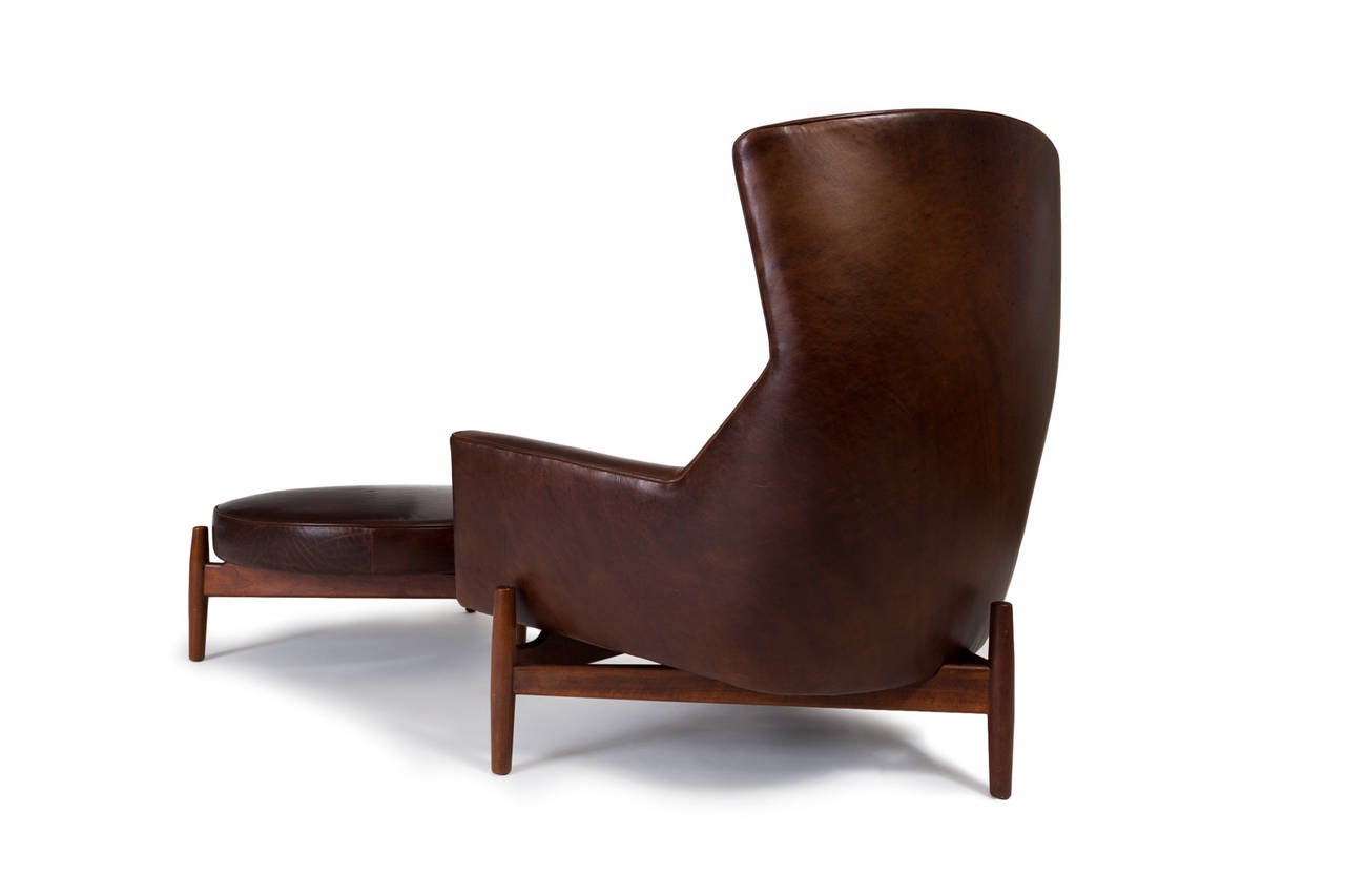 Lounge chair and ottoman.

Jens Risom, Inc.
USA , circa 1960.
Walnut, leather.
Measures: 37 W x 35 D x 42 H inches.

Rare example lounge chair and ottoman in leather. Limited numbers of this chair and ottoman exist. Matched pairs are more