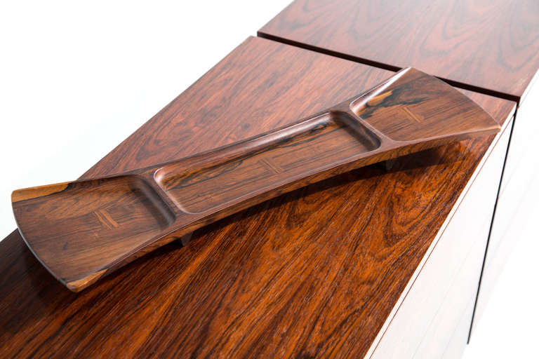 Jens Quistgaard for Dansk bow tie tray<br />
Denmark, circa 1960<br />
rosewood <br />
27.5 w x 8.25 d x 1.75 h inches<br />
<br />
Serving tray made from palisander rosewood in a bow tie shape with three separate sections, each section with