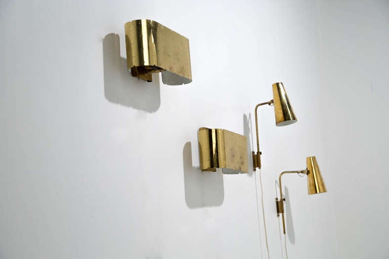 Pair of model 9060 Paavo Tynell sconces with crisp broad bands of brass, notched edges and a twin dot pattern.<br />
<br />
Taito OY, Finland, circa 1950, brass<br />
13.5 w x 7 d inches