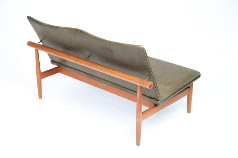 Finn Juhl Settee -  “Japan” 137 series

France & Daverkosen manufacturer
John Stuart distributor

teak dowel form frame
leather upholstery