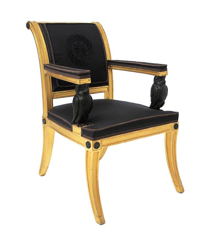 An extraordinary pair of 19th c. giltwood klismos armchairs with ebonized owl-form arm supports.  Most probably supplied to Adrian Hope, son of Thomas Hope, by Alexander Roos for the Carlton Gardens residence.