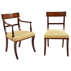 Set of sixteen dining chairs.