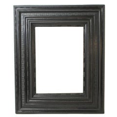 A Dutch Baroque ebony and ebonized mirror.