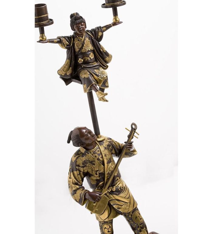 A very fine pair of Japanese multi-patinated bronze candelabra. 1