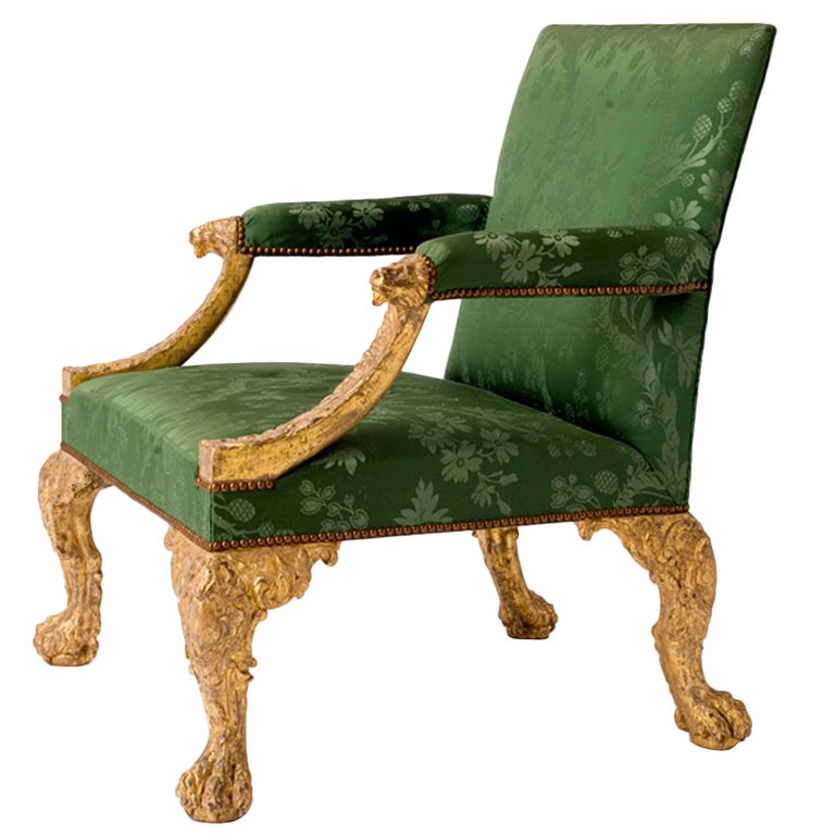 A superb George II carved giltwood Gainsborough chair For Sale