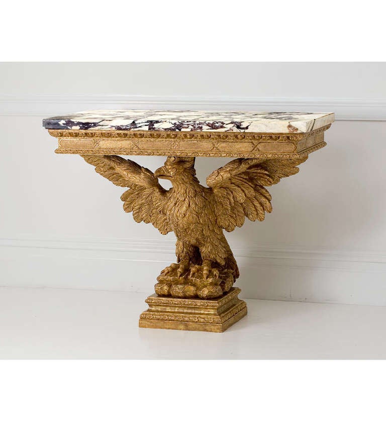 English A George II giltwood marble-topped console table. For Sale