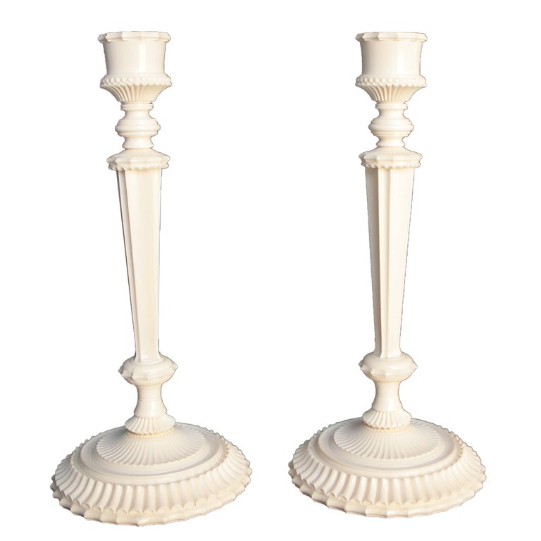 A pair of Anglo-Indian carved ivory candlesticks. For Sale