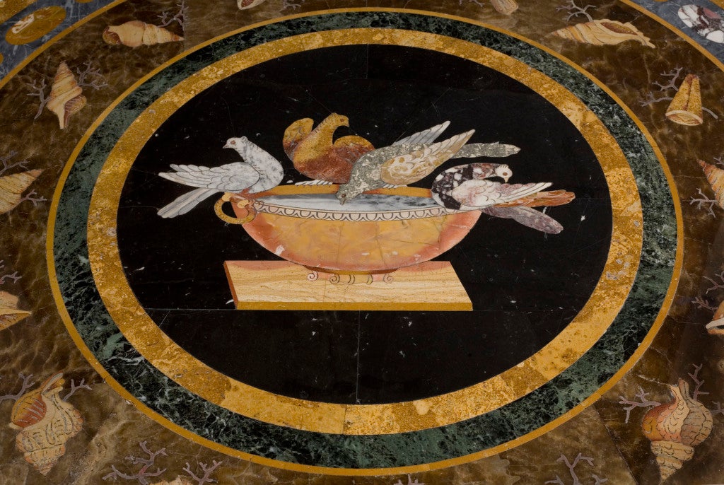 A William IV white painted and parcel gilt center table attributed to George Morant & Son, London, with an inlaid marble top depicting a central scene of doves drinking at a bowl, surrounded by concentric circles of various marbles depicting 'fruits