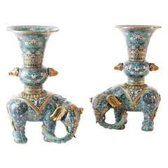 A pair of Chinese cloisonne enamel elephants.
