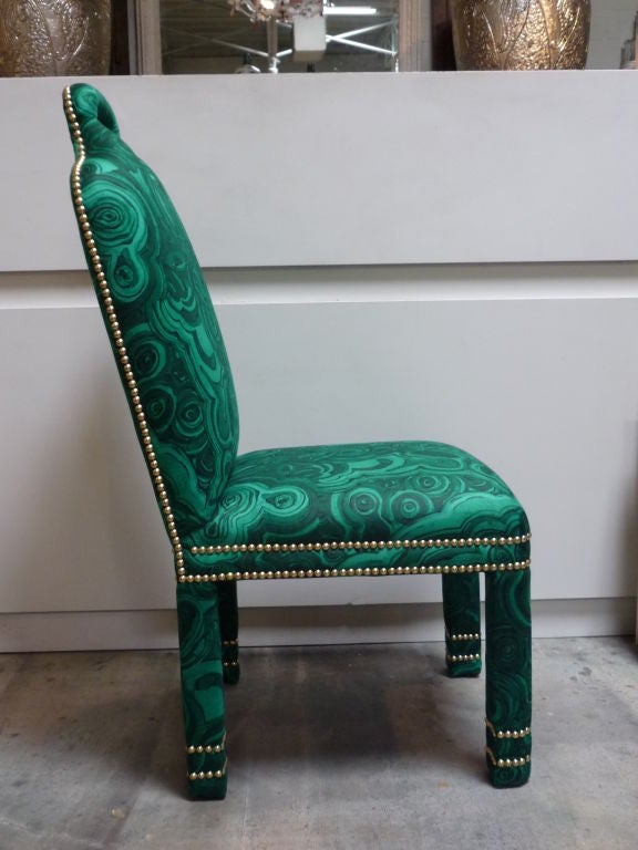 Contemporary pieces inspired by a 1960s design, upholstered in Tony Duquette Malachite silk with gold nailhead trim. Set of 10.