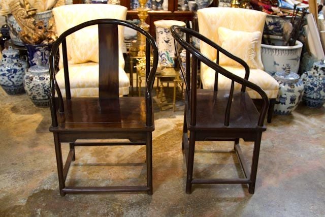 Beautiful pair of 1940's Chinese rosewood chairs. Horseshoe back. Great shape and finish.