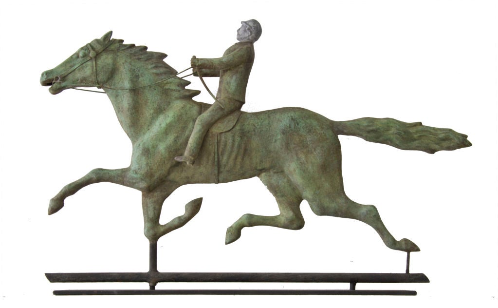 Perfectly weathered to an overall verdigris, this weathervane shows superb detail down to the rider's mustache and the musculature of the horse.  The horse is spirited and the piece has a dynamic movement.