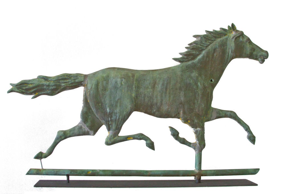 Oversized running horse with powerful sense of movement.  Detailed workmanship in mane, tail and articulation of ribs.