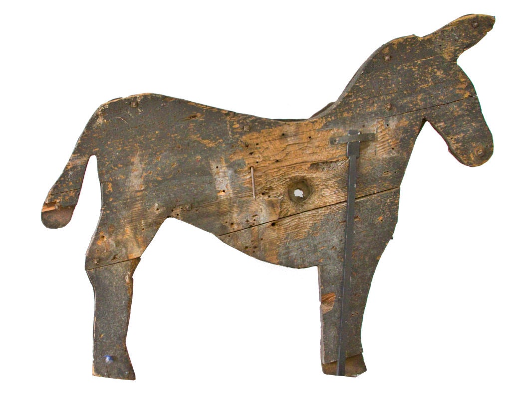 An extraordinary, rare and extremely early American donkey arcade target.  Untouched and in completely original state showing appropriate evidence of shot and paint wear.  Altogether, extremely appealing in size and form.  One of the largest and