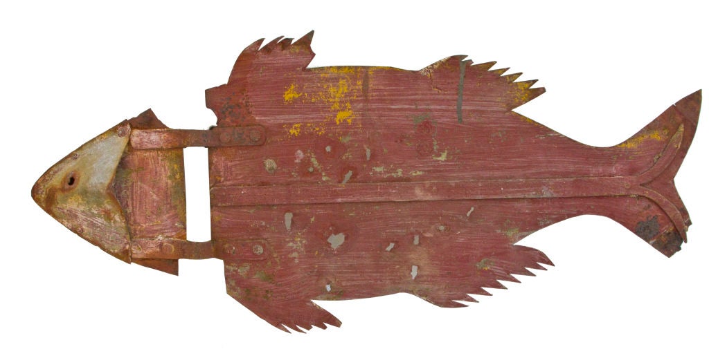 A phantasmagorical and whimsical, tinsmith made, individual effort fish weathervane.  Striking and unusual form with ravaged surface.  Pennsylvania origin.