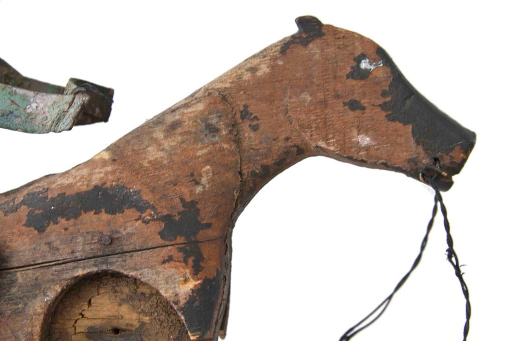Very folky, well crafted and whimsical early 20th century fragment of a horse and rider whirligig.