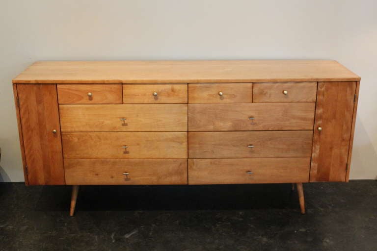A solid maple dresser with twenty drawers. Designed by Paul McCobb for Winchendon.