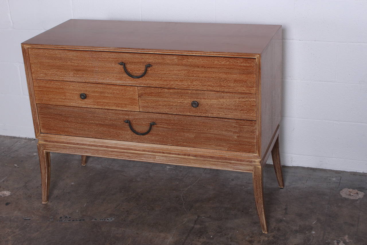 A cerused mahogany chest of drawers designed by Tommi Parzinger for Charak Modern.