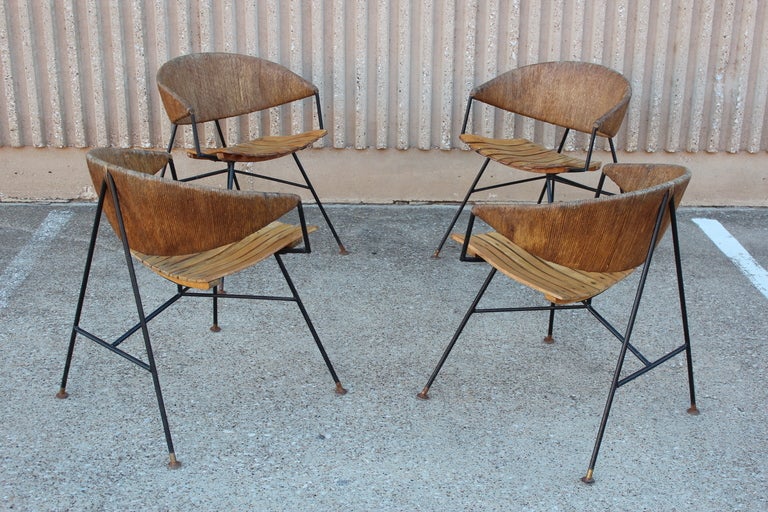 A rare set of four lounge chairs by Arthur Umanoff for Raymor. 