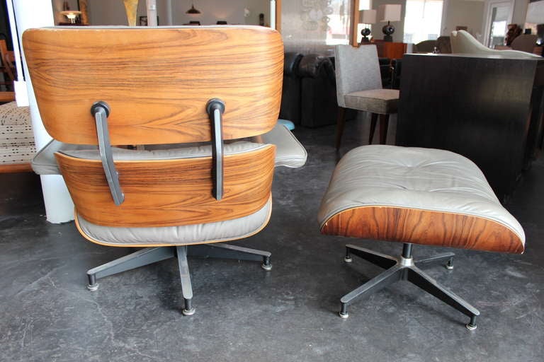 American Original Rosewood and Grey Leather Eames Lounge Chair and Ottoman