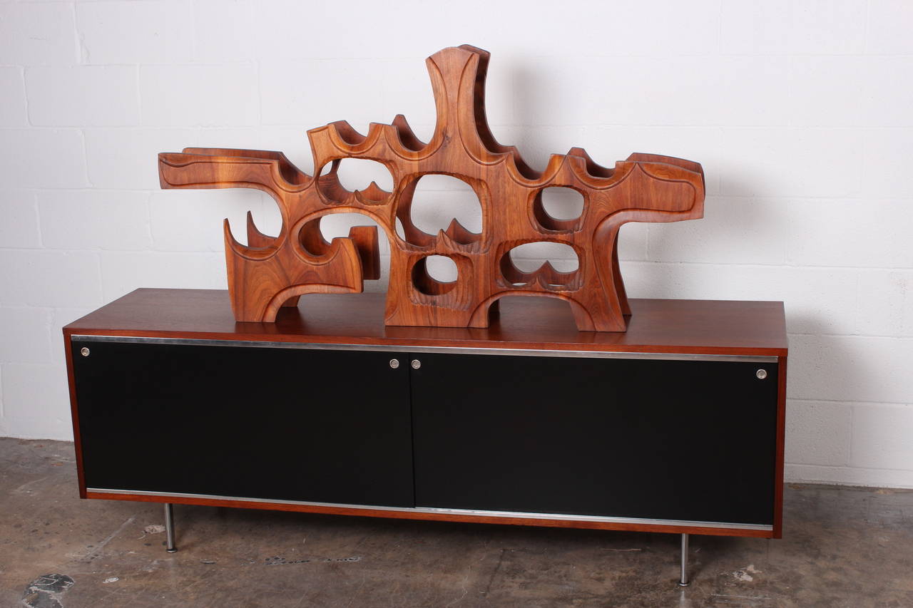 A large, sculptural wine rack crafted by Federico Armijo.
