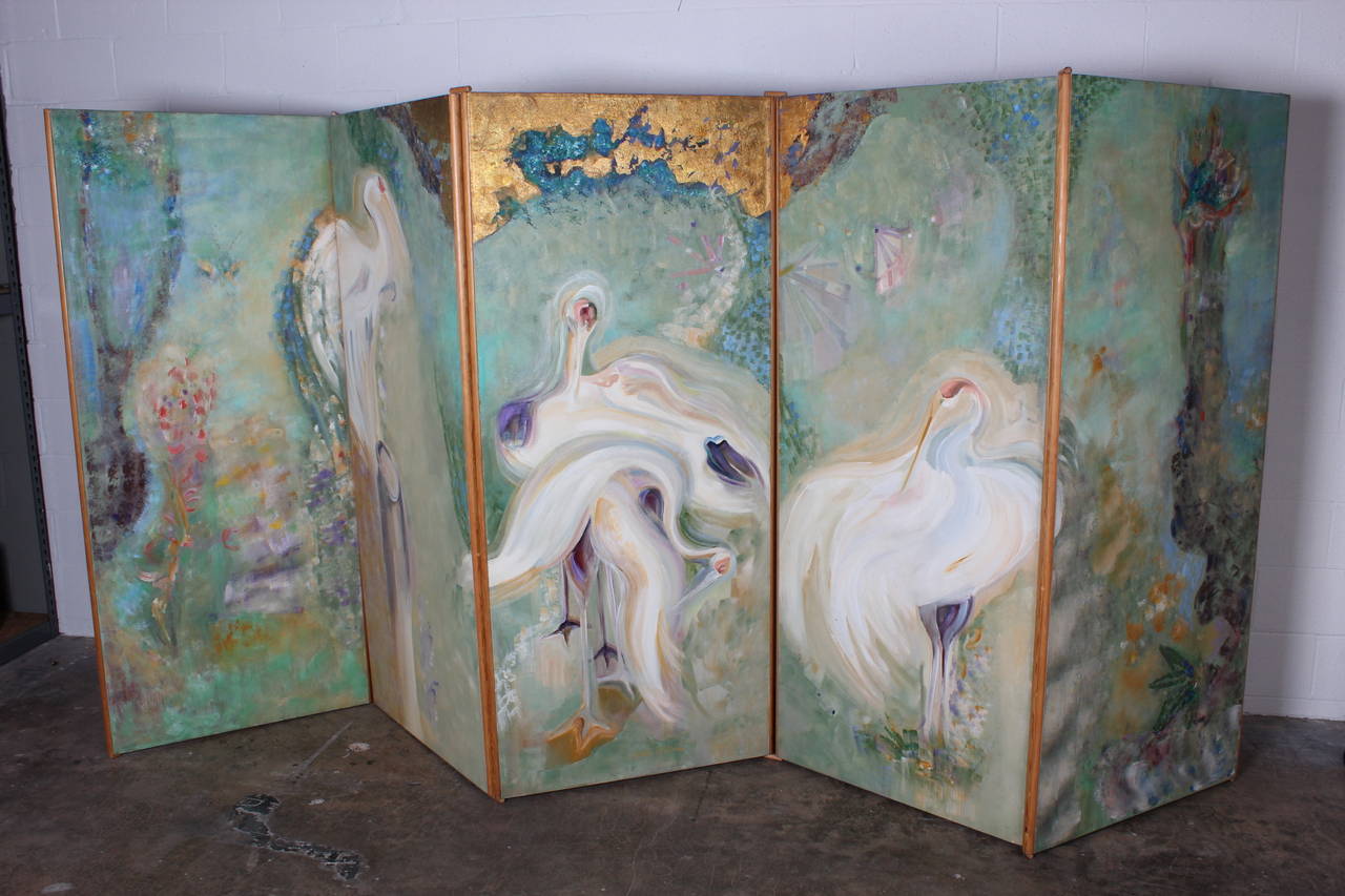 A large five panel oil on canvas folding screen by artist Doris Dillon, c 1980. This screen was used as a window display at Bonwit Teller in New York City in the 1980's. Ms. Dillon is an accomplished artist with works in collections throughout the