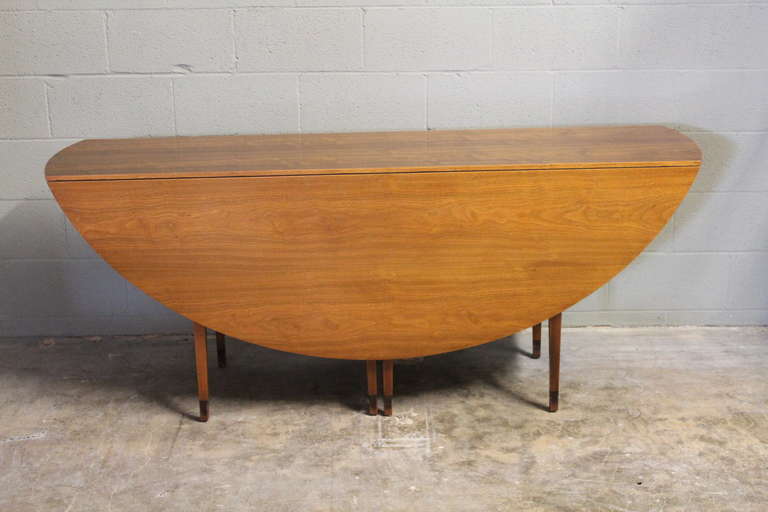 Early drop leaf dining/console table designed by Edward Wormley for Dunbar.