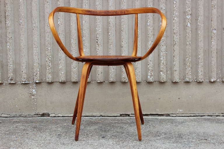 An early and rare pretzel armchair designed by George Nelson for Herman Miller. This example in all original condition.