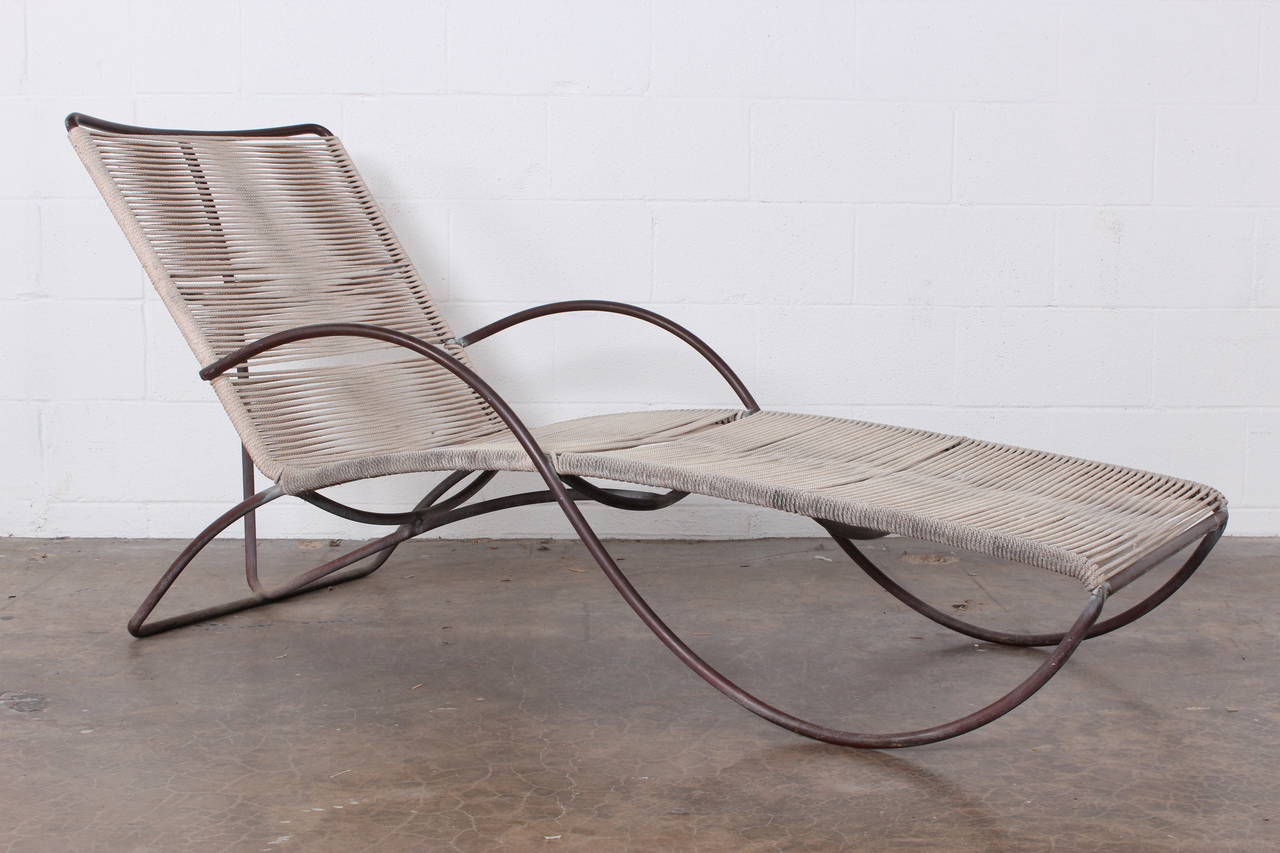 A beautifully patinated pair of bronze S chaise longue chairs designed by Walter Lamb for Brown Jordan.
