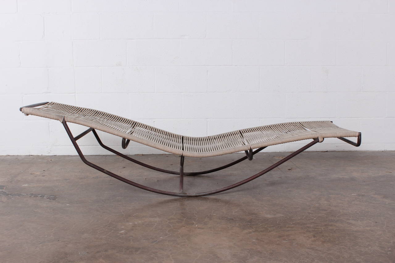 A beautifully patinated bronze rocking chaise longue by Walter Lamb for Brown Jordan.