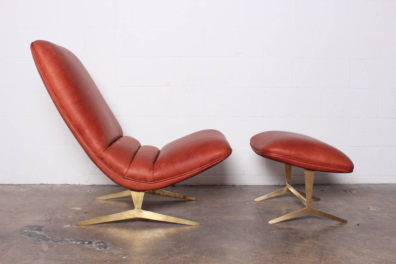 Mid-20th Century Lounge Chair and Ottoman with Brass Base