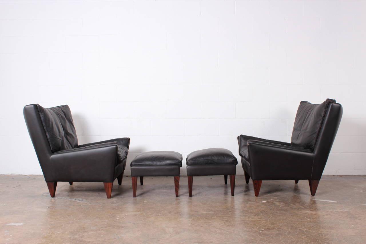 Pair of Lounge Chairs and Ottomans by Illum Wikkelsø 4