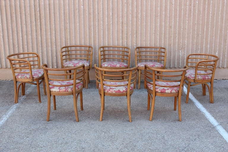 A set of eight barrel back dining chairs by Thonet.