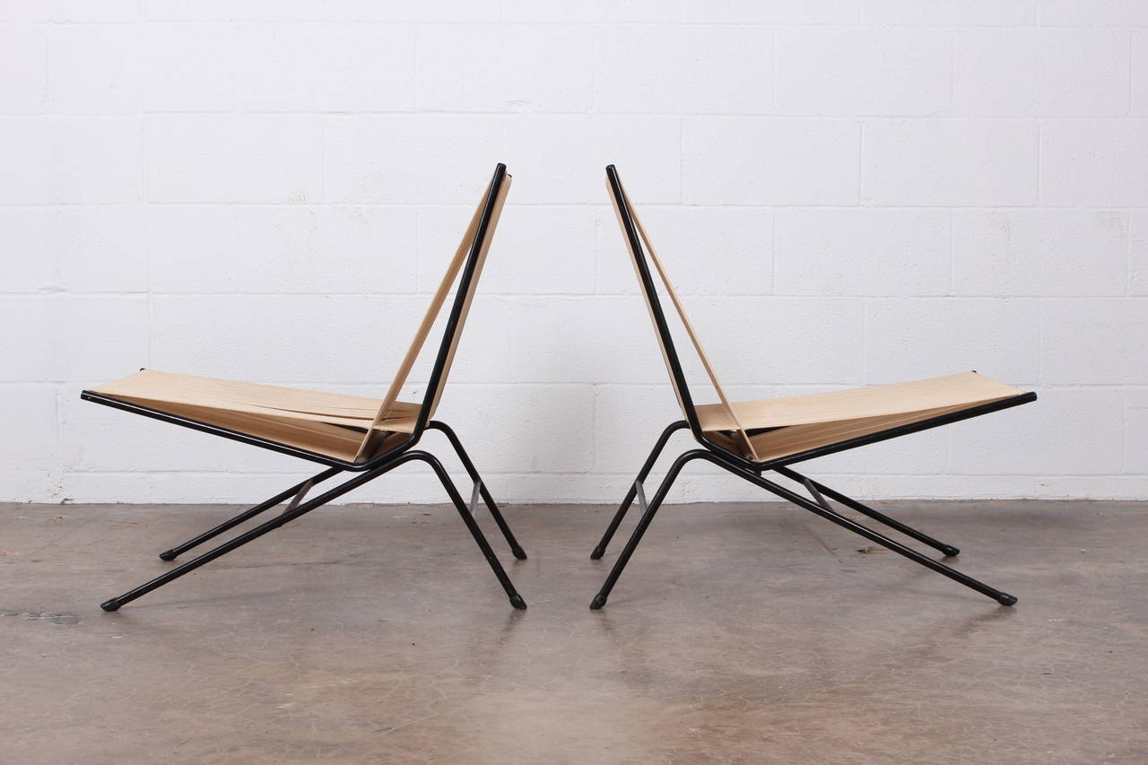 A rare pair of string lounge chairs designed by Allan Gould.