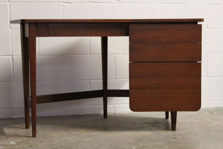 A rare angled desk designed by Bertha Schaefer for Singer and Sons.