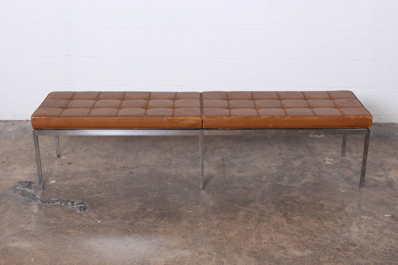 A chrome bench with original leather designed by Florence Knoll for Knoll.
