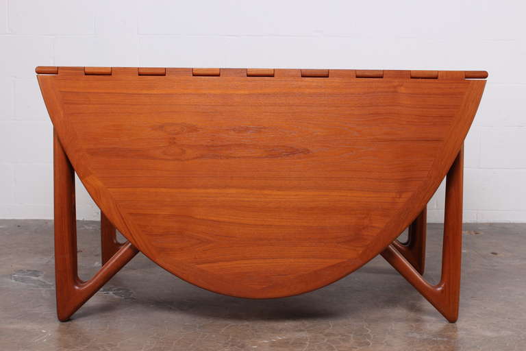 A sculptural and well crafted solid teak table designed by Kurt Ostervig.