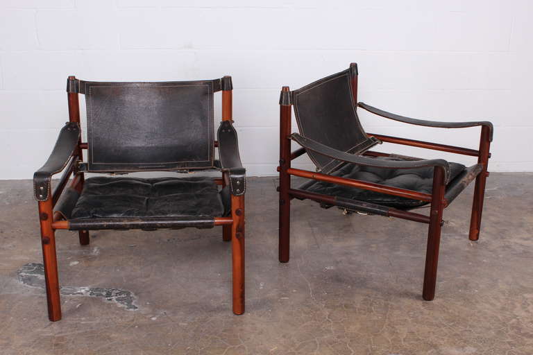 Danish Pair of Rosewood Safari Chairs by Arne Norell